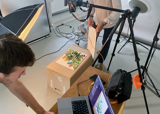 Aarhus University photographers, Nicolai Hildebrand and Lars Kruse, created a high-resolution image of the paper artwork for the journal cover. Photo: Lise Refstrup Linnebjerg Pedersen