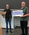PhD student Jakob B. Grinderslev receives the Danscatt PhD award 2020 by Professor Bo Brummerstedt Iversen at the annual Danscatt meeting. (Private photo)